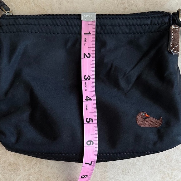 Dooney & Bourke Black Nylon Crossbody Bag with leather trim and pink interior - Picture 15 of 16